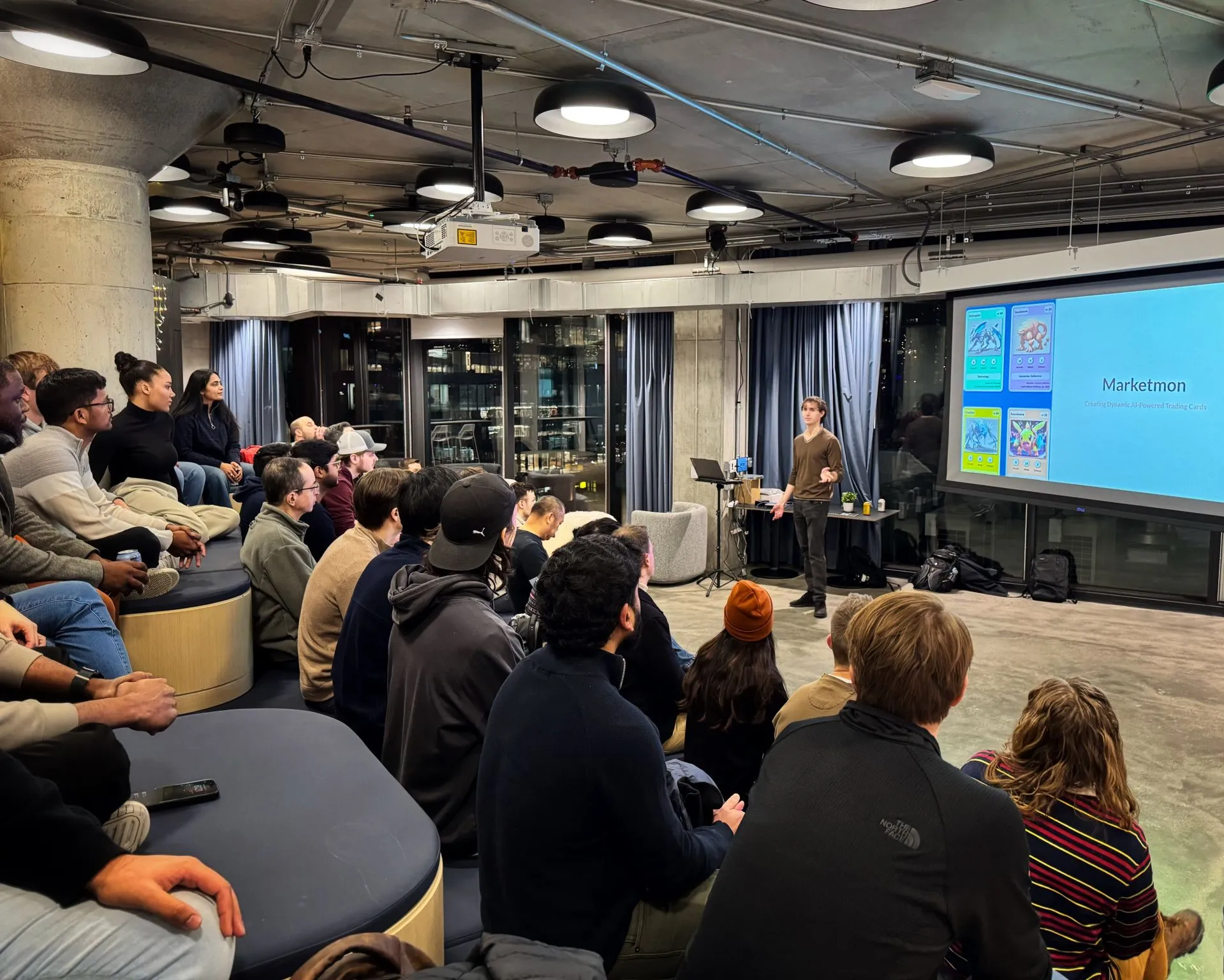 Logan presenting Marketmon at AI Tinkerers Chicago